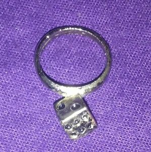 A Faux silver dice ring.